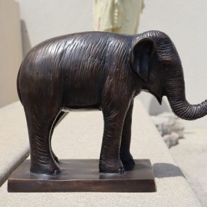 Vintage Bronze Elephant with the trunk up.
