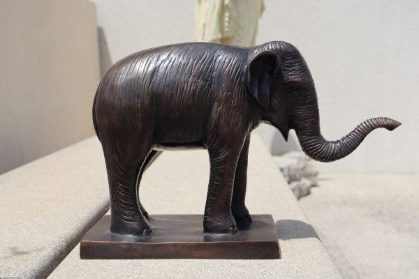 Vintage Bronze Elephant with the trunk up.