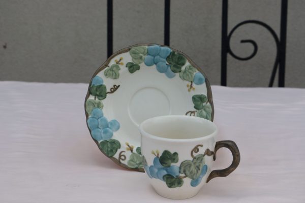 6 Sculpture Grape teacup and Saucer by Metlox.